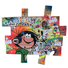 Load image into Gallery viewer, Pop art tableau of Gaston Lagaffe, featuring vibrant colors and textures, made from palette wood.