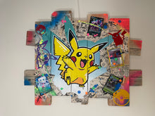 Charger l&#39;image dans la galerie, Pikachu pop art on recycled wood palette, showcasing vibrant colors and playful design.