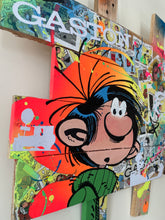 Load image into Gallery viewer, Tableau pop art vibrant de Gaston Lagaffe, avec couleurs éclatantes et textures en acrylique sur palette en bois.