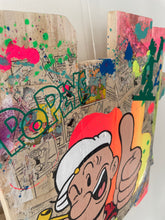 Cargar imagen en el visor de la galería, Pop Art painting of Popeye on recycled wood, vibrant colors and dynamic design showcasing iconic character.