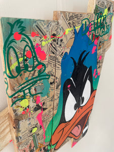 Contemporary pop art interpretation of Daffy Duck on palette wood, featuring vibrant colors and mixed media.