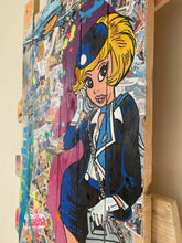 Load image into Gallery viewer, Tableau POP Art de Natacha, héroïne de bande dessinée, sur planches de palette recyclées.