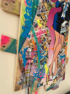 Vibrant pop art painting of Natacha on recycled wood, showcasing dynamic colors and textures.