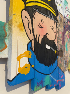 Colorful POP Art of Captain Haddock, featuring bold shapes and vibrant colors, made from pallet boards.