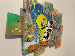 Pop Art tableau of Titi and Grosminet on recycled wood, featuring vibrant colors and playful design.